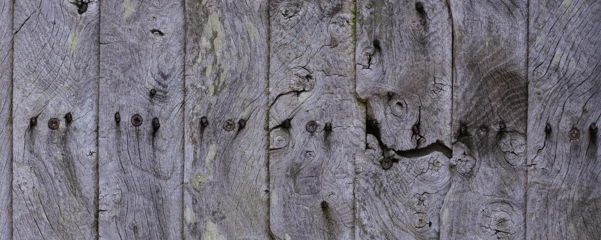 Dark heat-treated timber